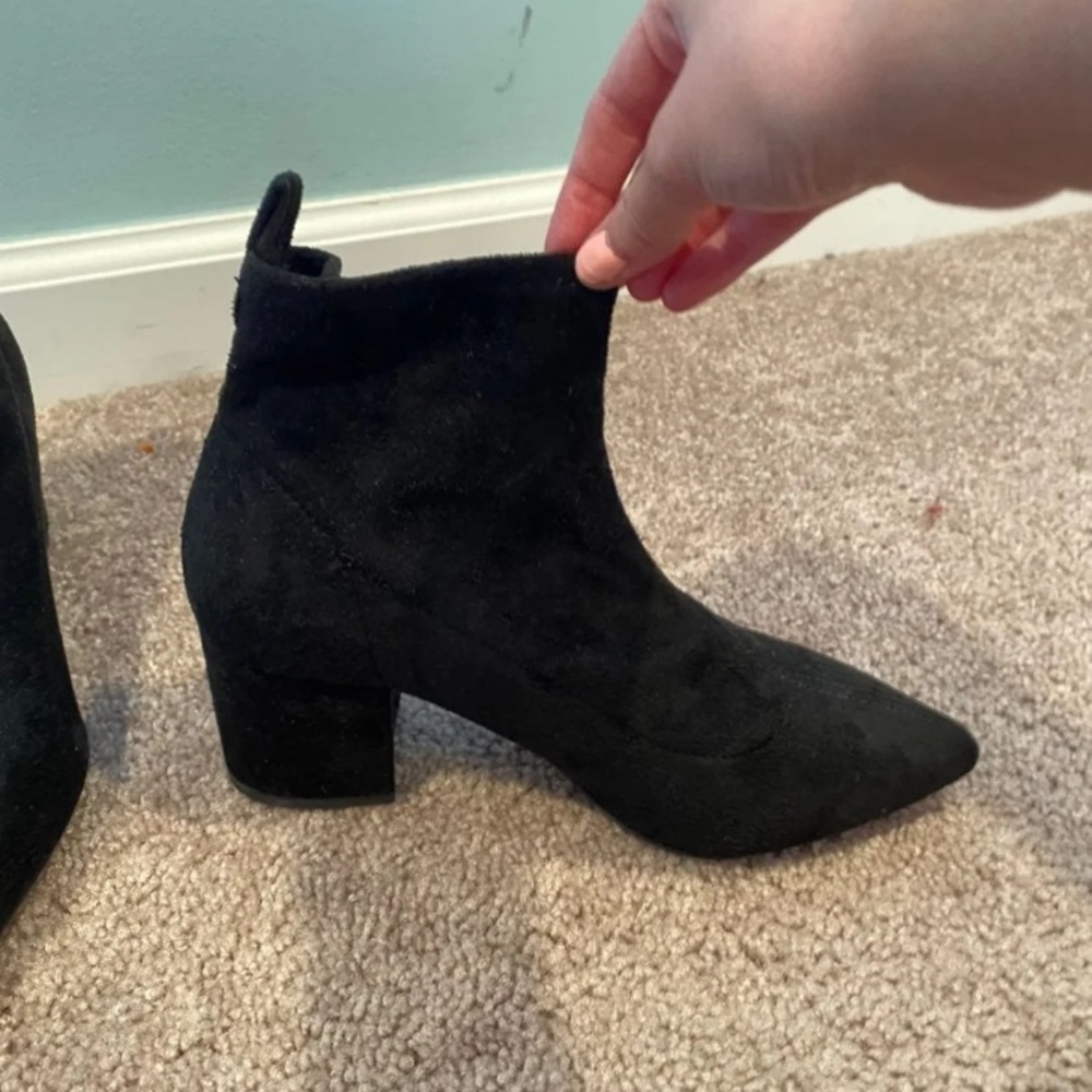 Black heeled booties from Fashion Nova